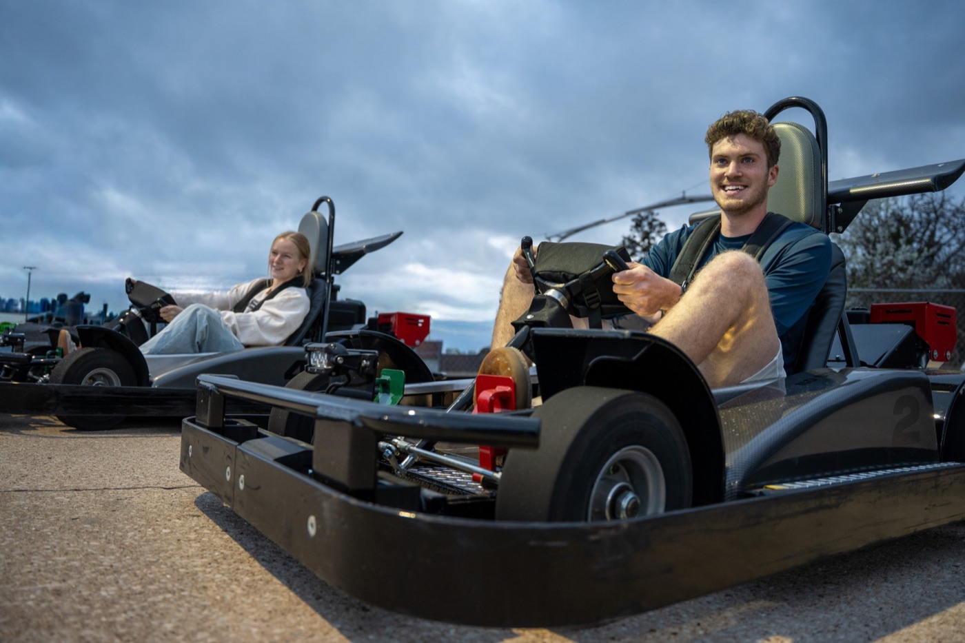 Riders racing go-karts at The Track Family Fun Parks in Branson.
